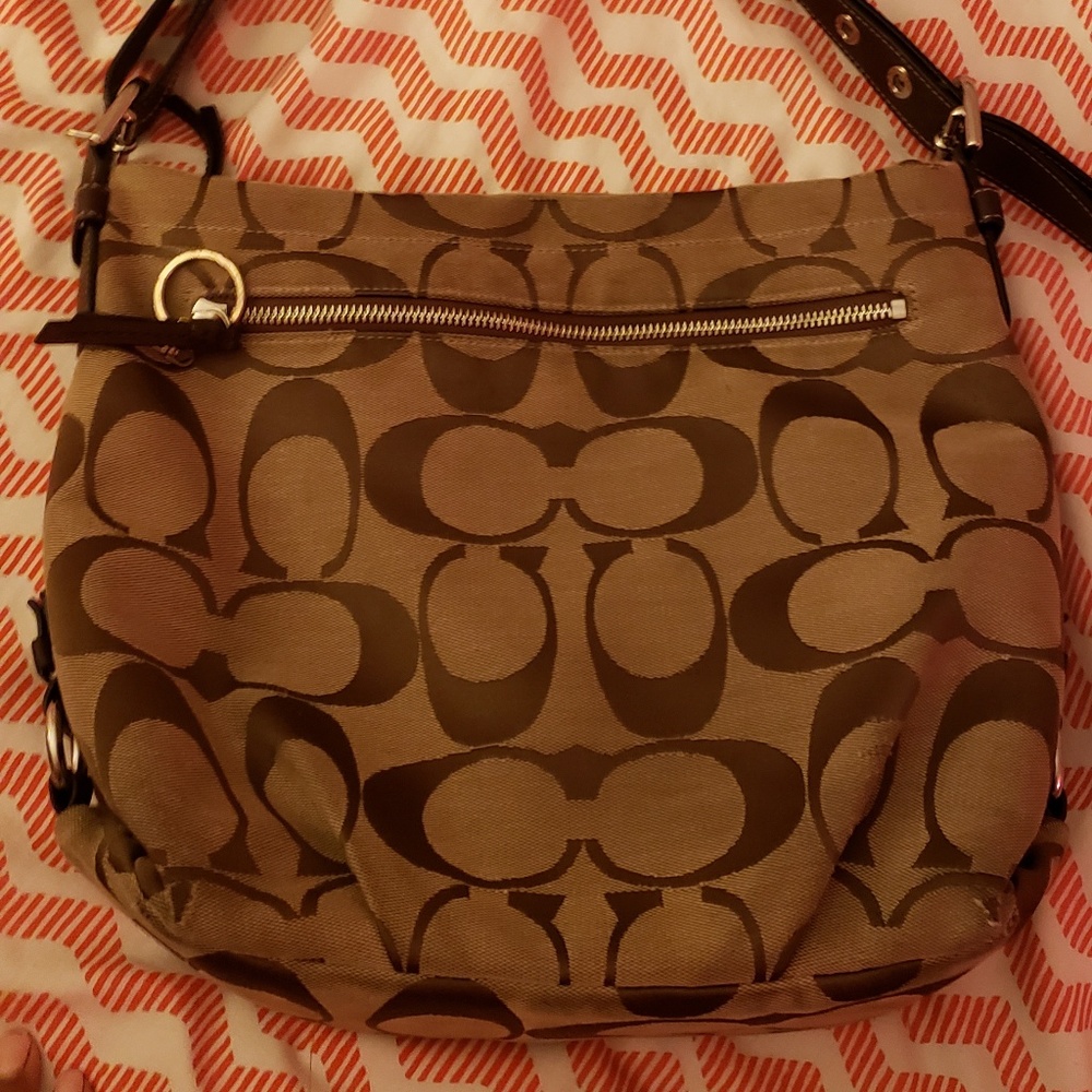 Purse, cross, some damage